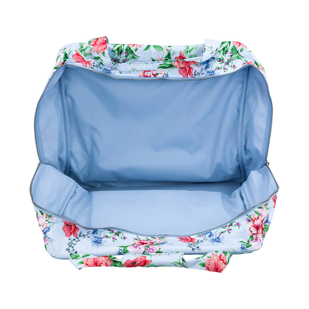 Open interior of Gütermann x Birch Blooms blue sewing machine bag