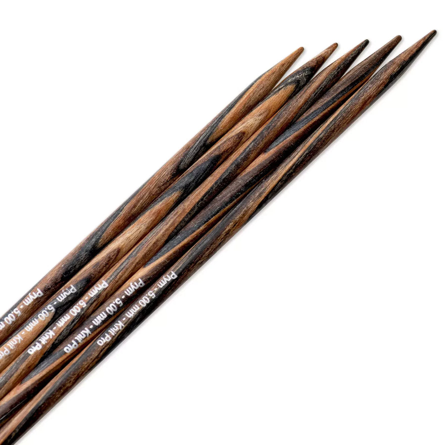 Close detail of Prym KnitPro natural wood double-pointed needle surface