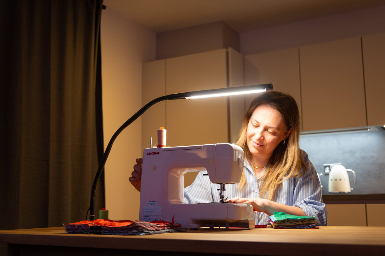 Daylight Electra A35221 clamp table lamp lighting a sewing machine
