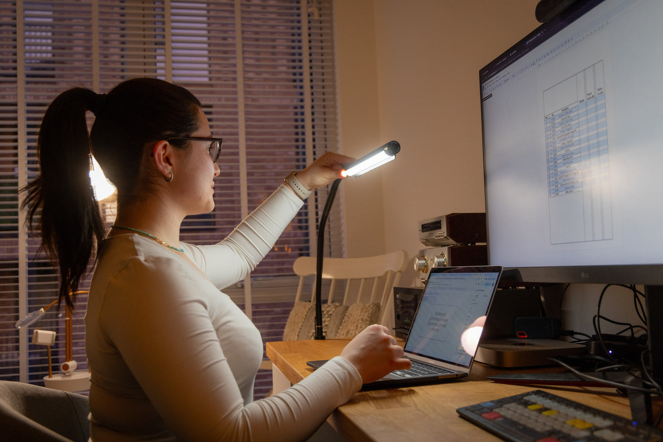 Daylight Electra Table lamp positioned over a home office desk