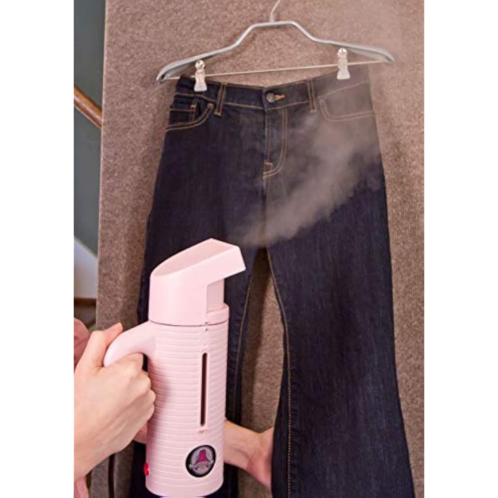 Pink Jiffy ESTEAM producing steam on hanging denim
