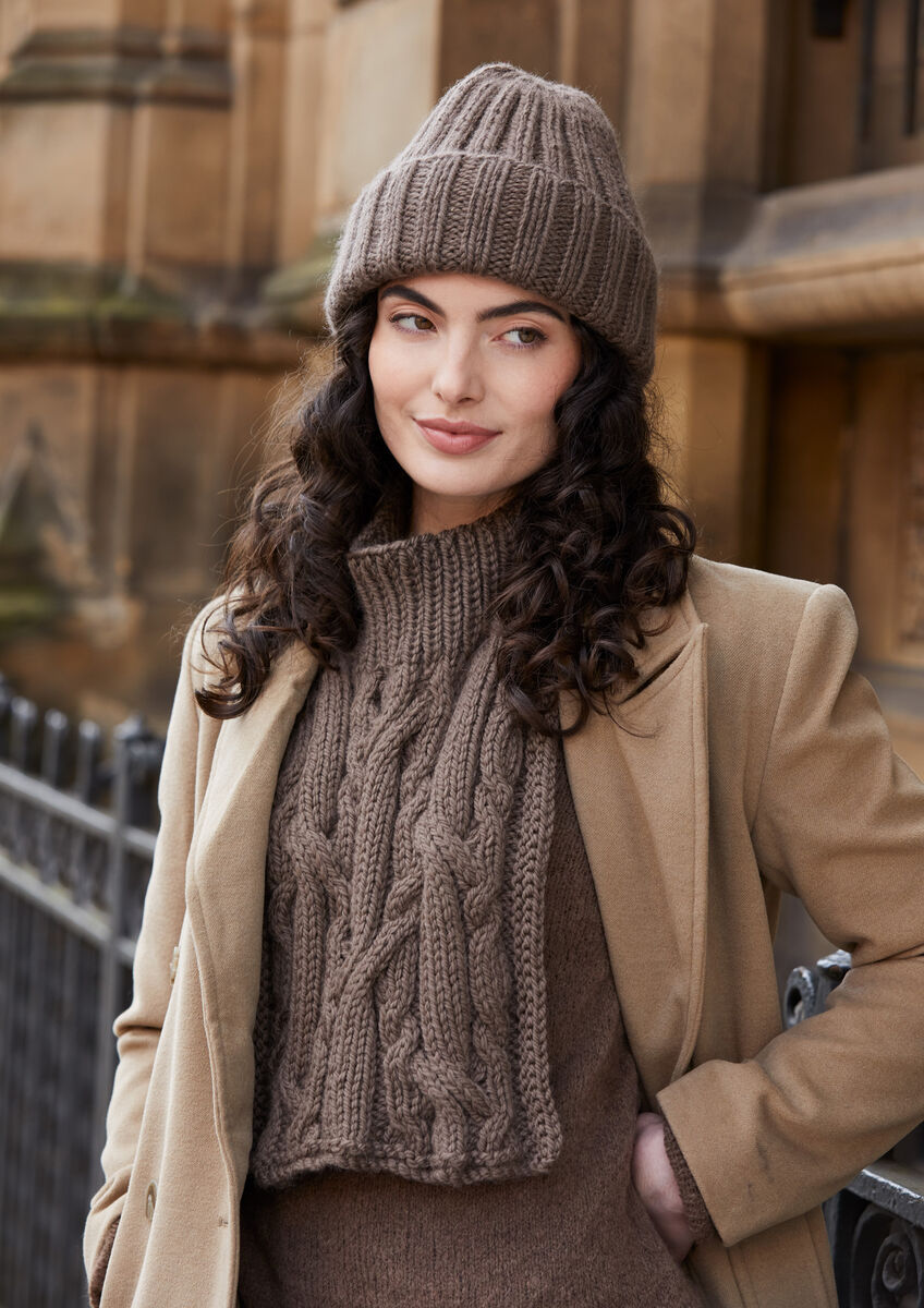Mode at Rowan Daphne Chunky Wool hat and cable bib knitting pattern MIP65