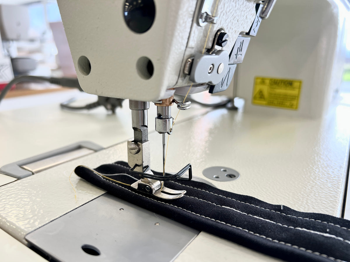 Close view of the Zoje A7100 needle and presser-foot area