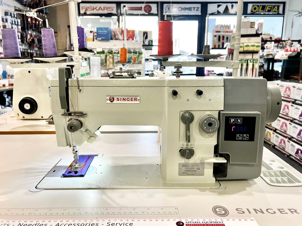 Singer 20G-125CEA industrial zigzag sewing machine, front view on sewing table