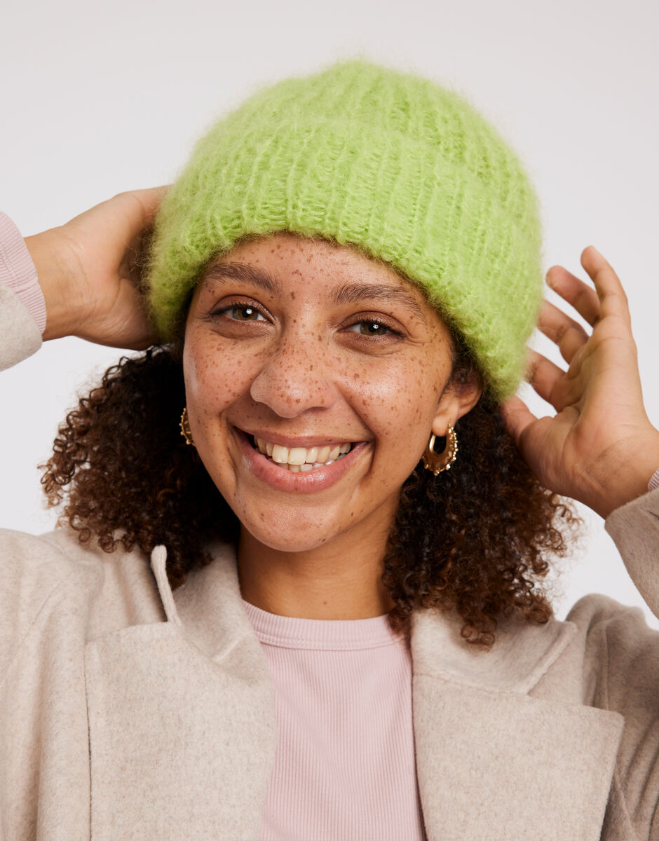 Wool and the Gang Mutya Hat Knitting Pattern for Take Care Mohair, finished design example