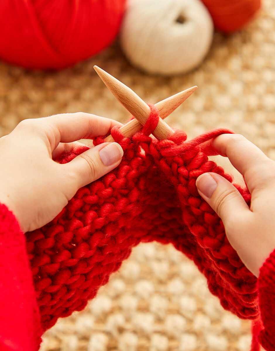 Sirdar bamboo knitting needles showing colourful hand-painted stopper ends