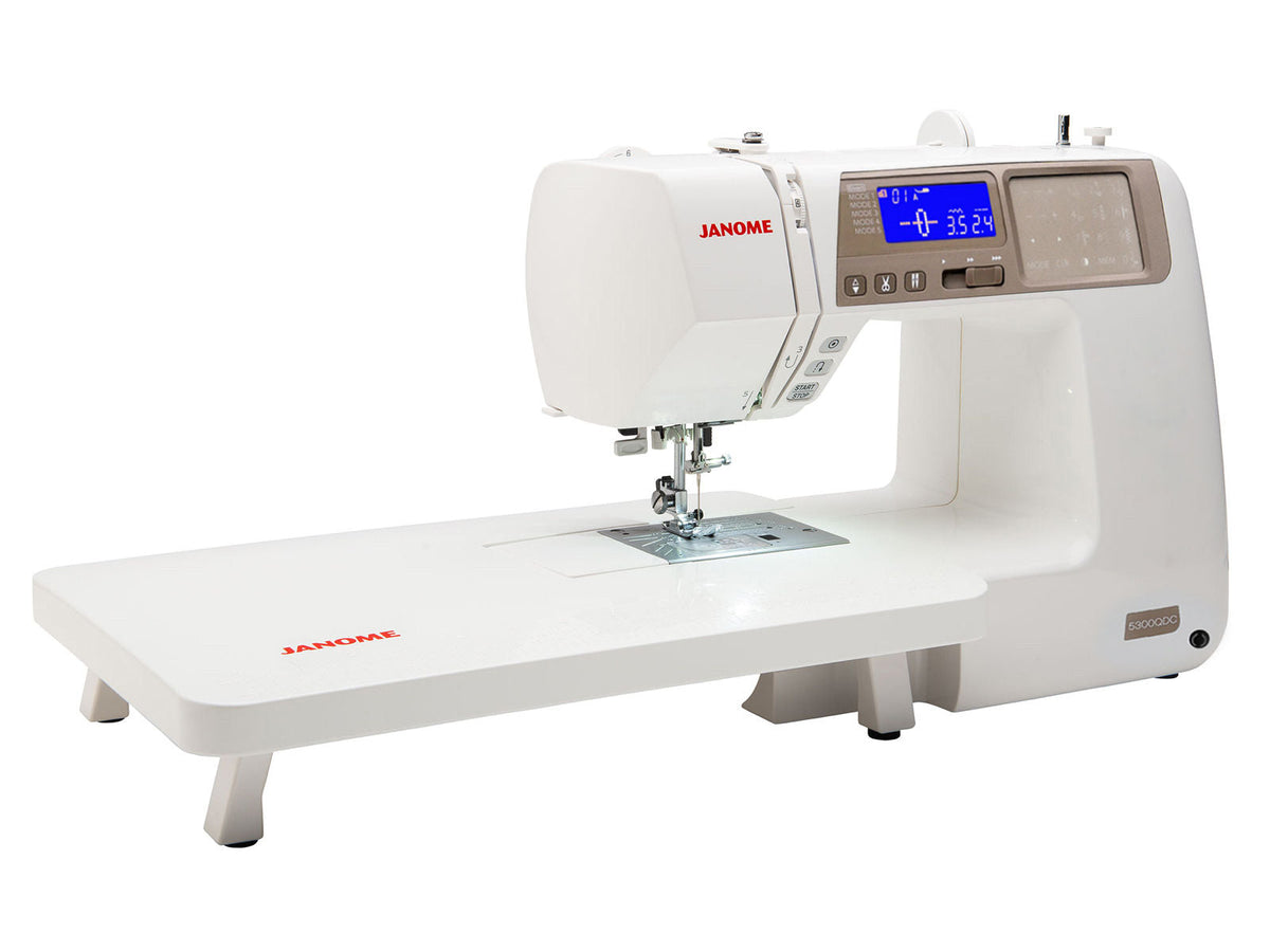 Janome 5300QDC electronic sewing machine, with extension table