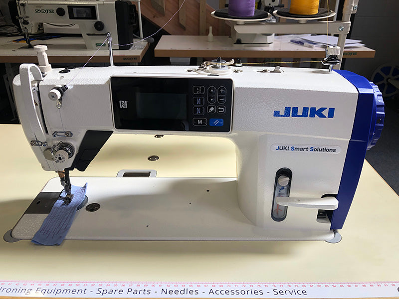 Juki DDL-9000C automatic industrial sewing machine, front view on sewing table