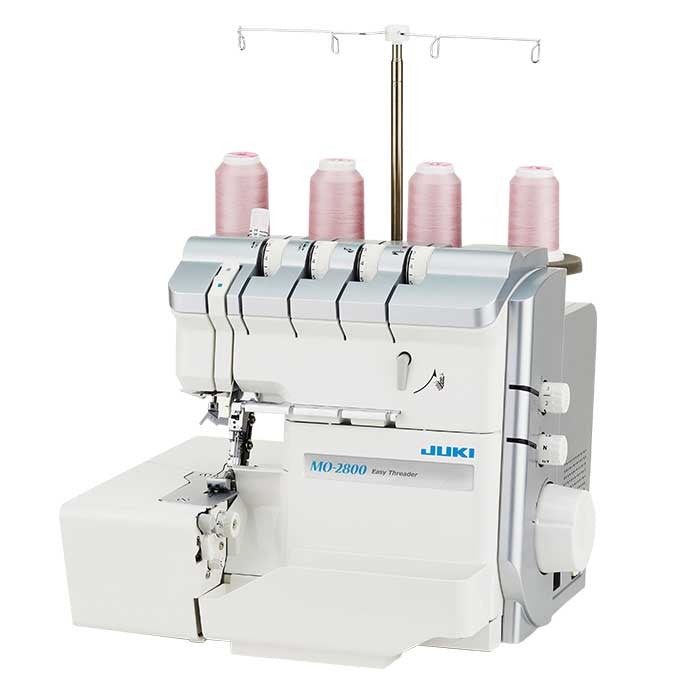 Juki MO-2800 air-threading overlocker with pink thread cones, angled view