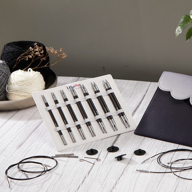 KnitPro Karbonz Midi 13cm needle tips, swivel cables, accessories and grey case arranged for knitting