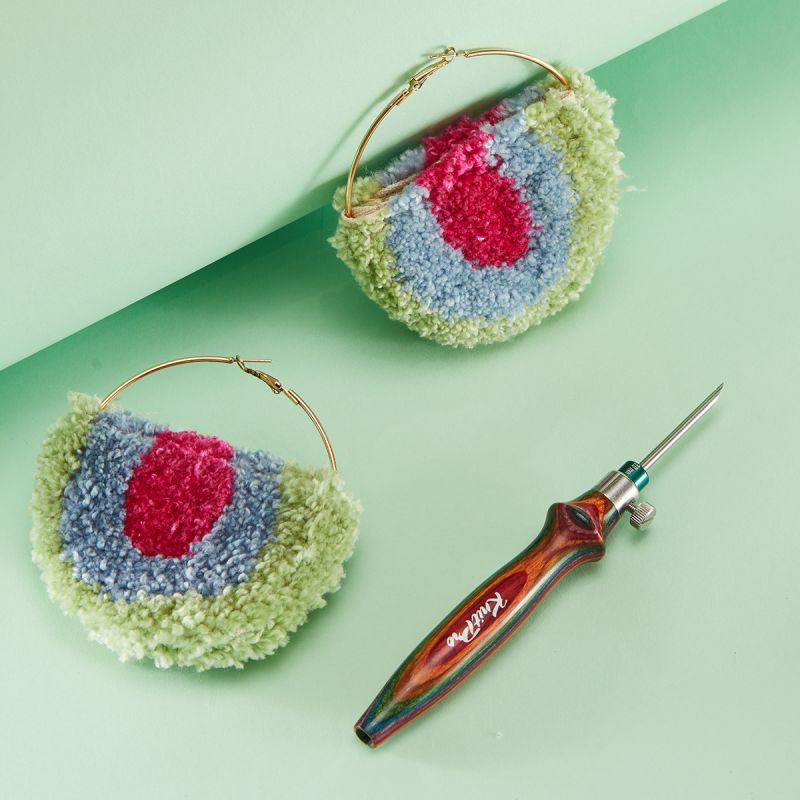 KnitPro Vibrant adjustable punch needle tool beside textured punch needle earrings