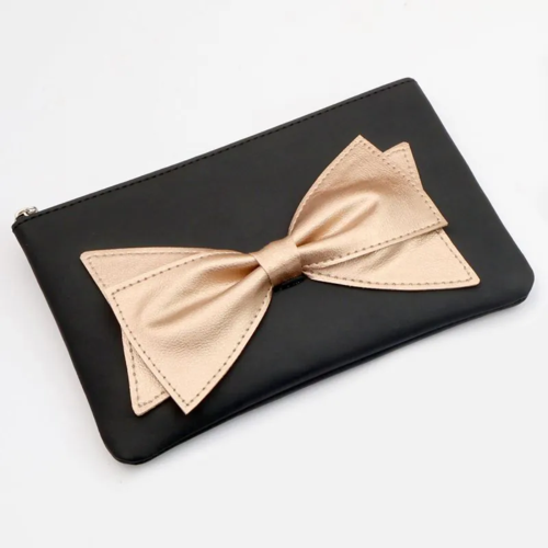 Closed black KnitPro Mini Bouquet PU pouch with large rose-gold bow