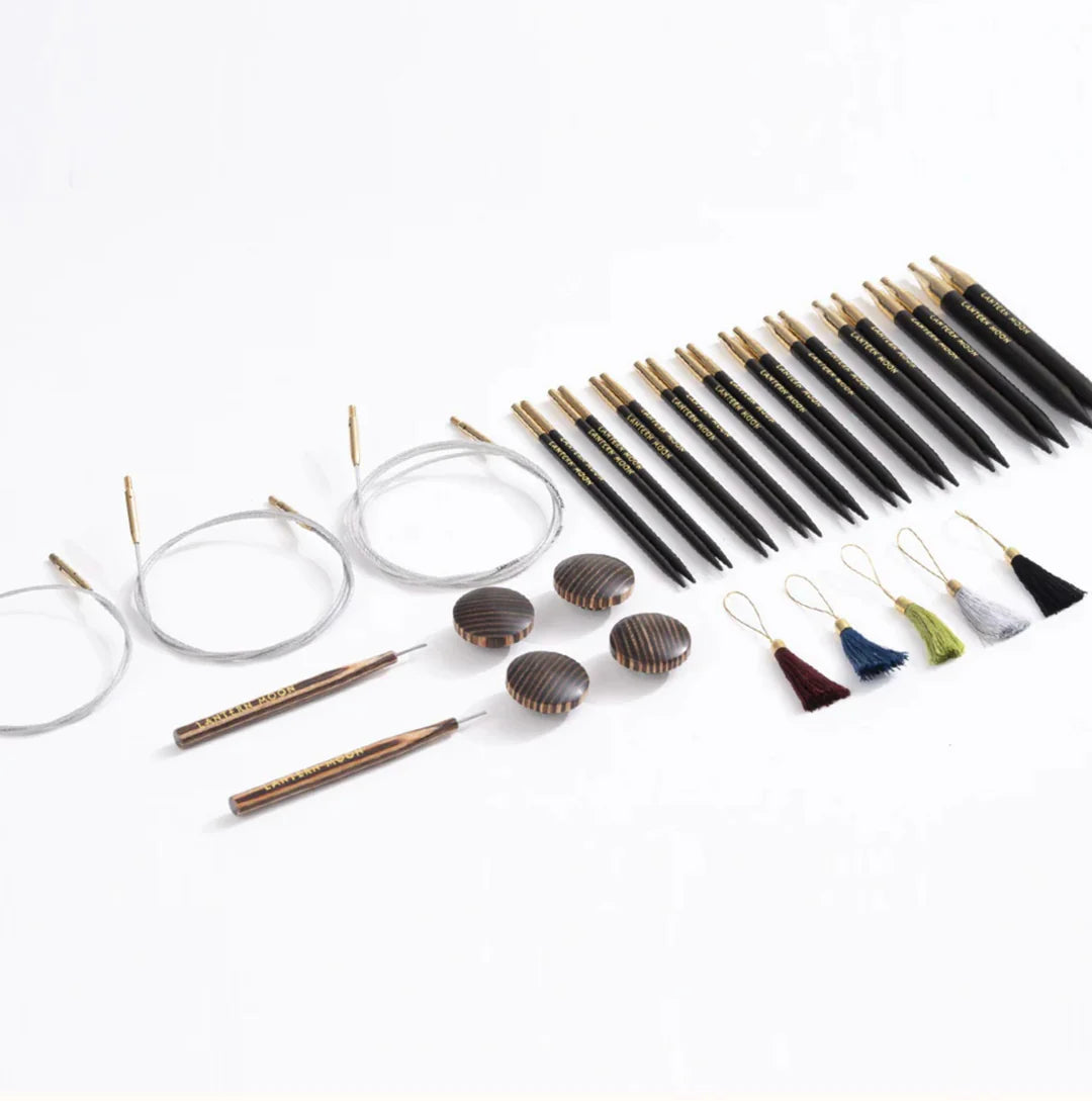 Lantern Moon Heirloom ebony needle tips, three swivel cables, end caps, tightening tools and five tassel stitch markers