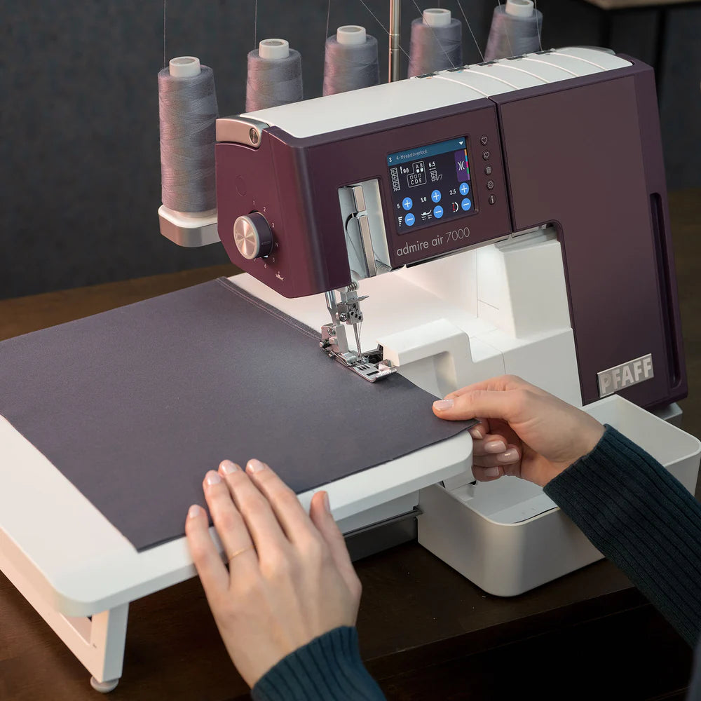 PFAFF admire air 7000 coverlock machine sewing fabric with extension table