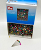 Prym assorted pearl-headed pins in an open display box with loose pins in front