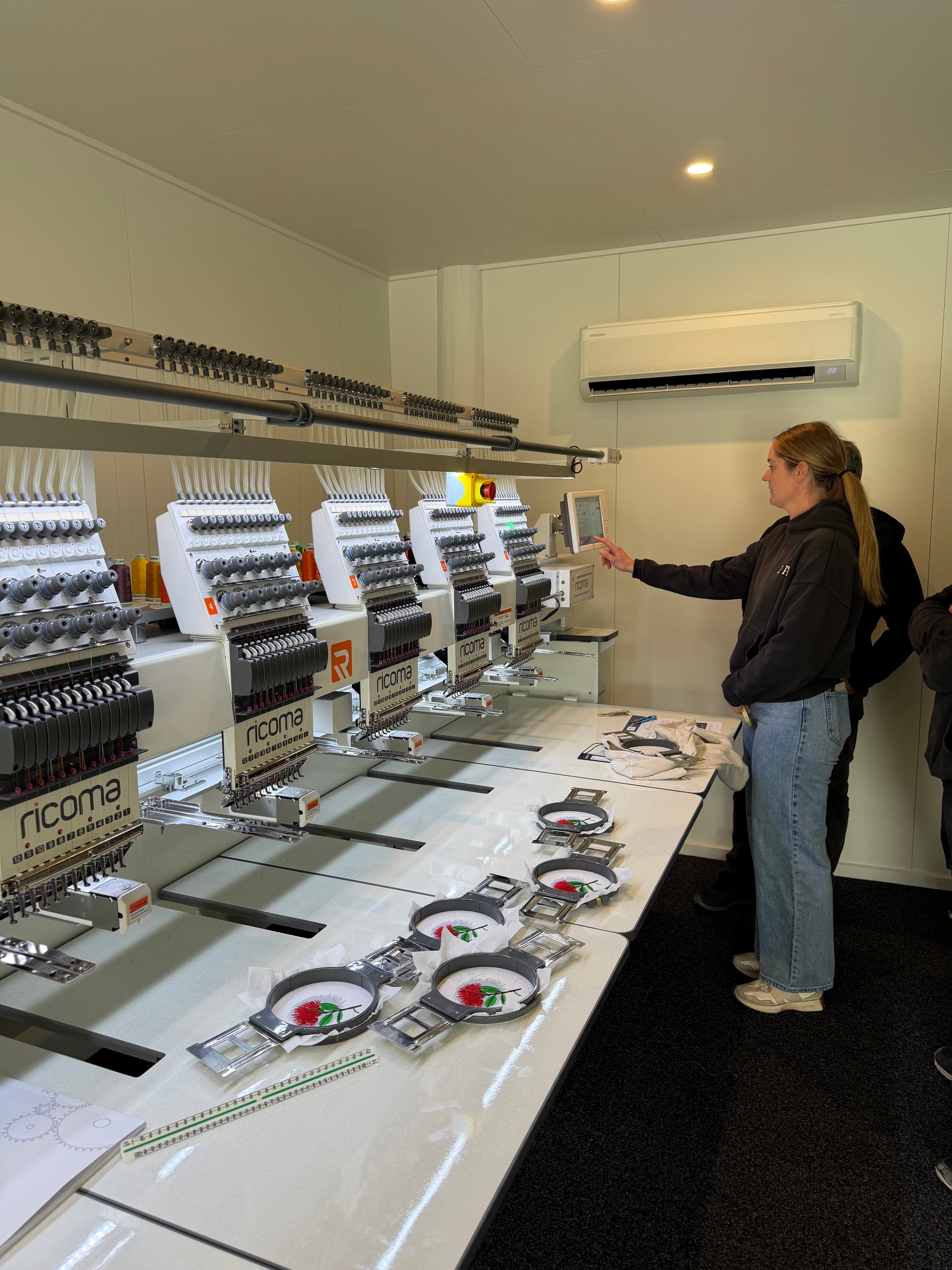 Six matching embroidered test designs produced during Ricoma training at Naninama Embroidery