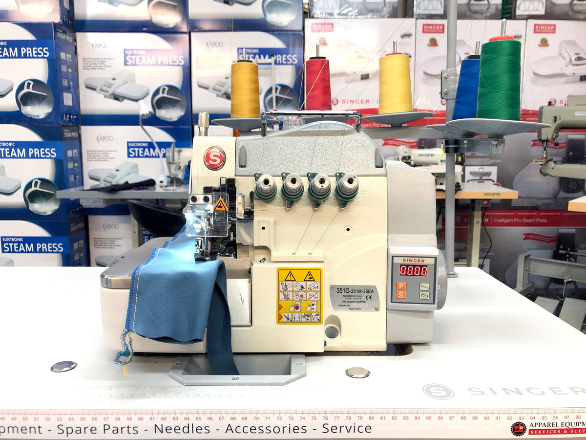 Singer 351G-251M five-thread industrial overlocker with thread stand and fabric sample