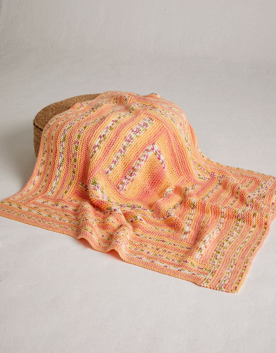 Sirdar Hayfield Little Buds Blanket Knitting Pattern 5574 – Baby Blossom Chunky Blanket Pattern, finished design example