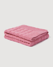 Wool and the Gang Bluebird Blanket Knitting Pattern for The One Cotton, folded pink blanket example