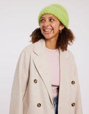 Wool and the Gang Mutya Hat Knitting Pattern for Take Care Mohair, finished design example