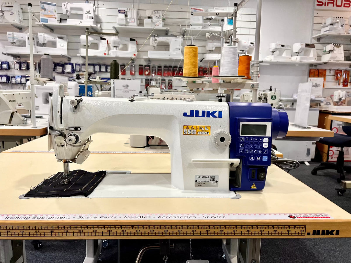 Juki DDL-7000AS7 automatic industrial sewing machine, front view on sewing table
